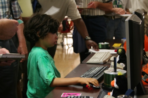 child looking at Ubuntu PC